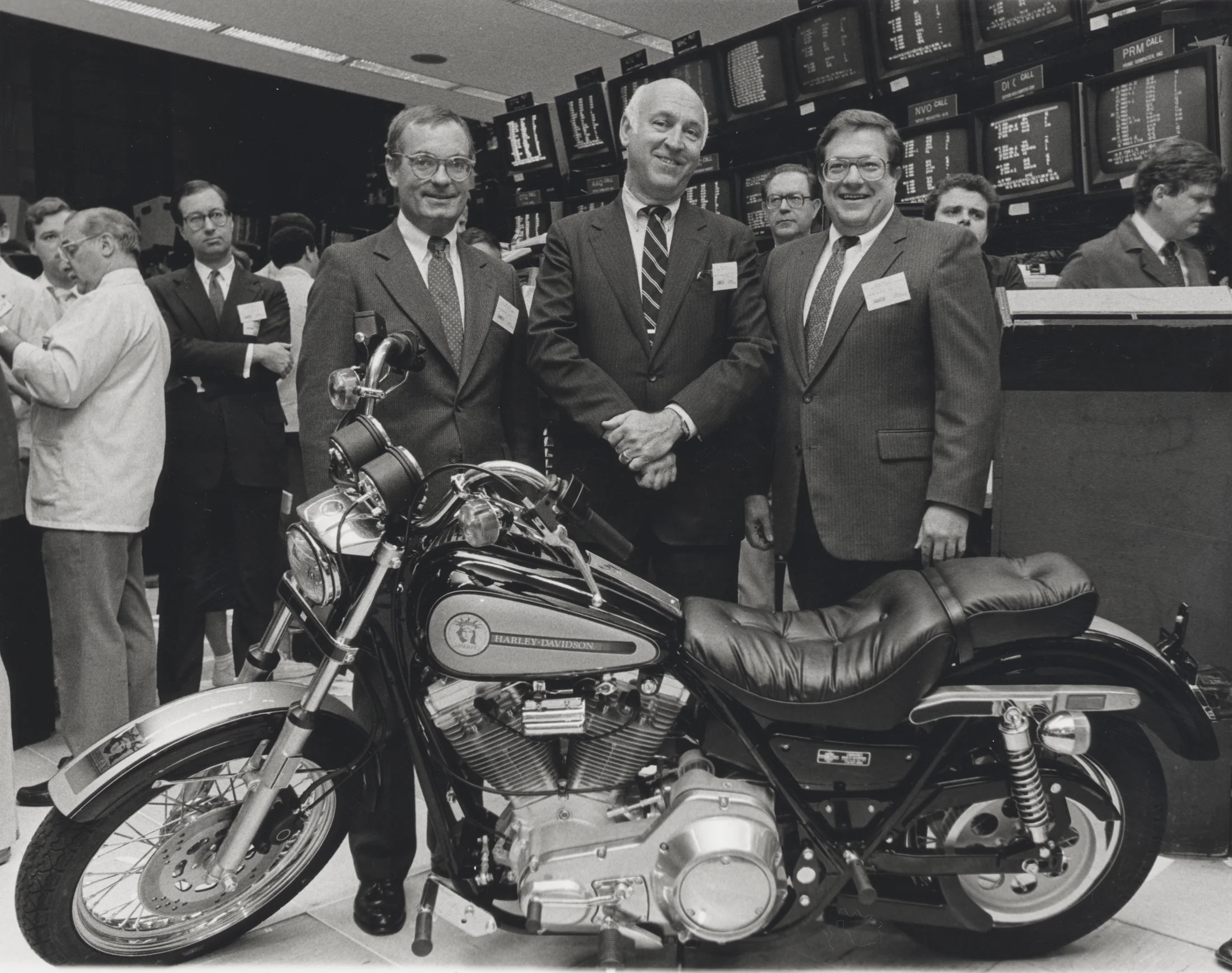 Harley-Davidson executives with a motorcycle