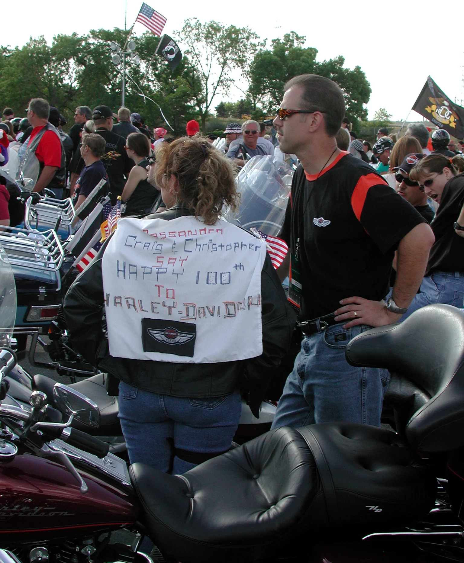 Rider wearing a Happy 100 anniversary vest