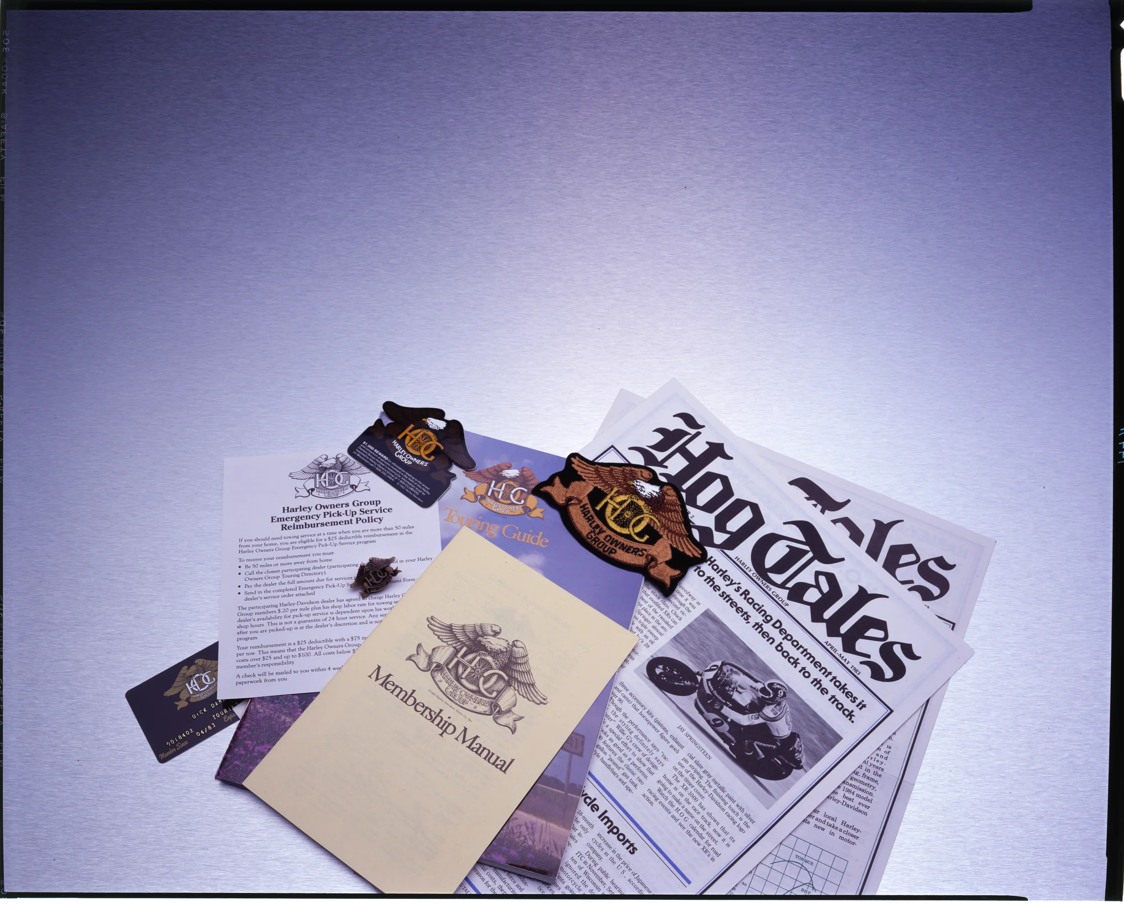 HOG literature and memorabelia, including HOG Tales, the Touring Guide, membership cards, etc.